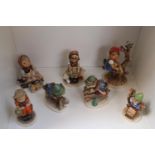 Collection of 7 Hummel figures to include Apple Tree boy, Spring Blossom girl etc