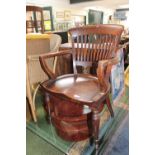 Edwardian Oak Stick back Elbow chair with shaped seat
