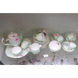 Queen Anne Floral decorated pastel green gilded Tea and Coffee set