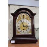 Kienzle Mantel clock with brass and silvered dial and roman numerals