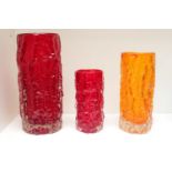 3 Whitefriars Textured Bark Vases in Tangerine and Ruby Red. 9 1/2'', 8'' and 6'' by Geoffrey Baxter