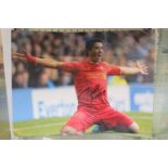 Unframed Luis Suarez singed photo 'Scoring against Everton' with A1 certificate