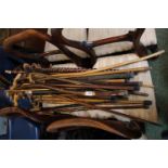 Very Large collection of assorted carved Sticks and Canes inc. Snake design, Antler etc