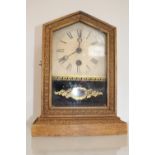American mantel clock with roman numeral dial