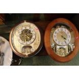 Seiko Melody in Motion clock and a Rhythm Small World wall clock