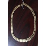 Ladies 9ct Gold necklace of flanked design 21g total weight