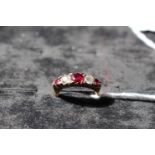 18ct Yellow gold Ladies Diamond and Ruby Set ring of 5 stones. 4.3g total weight. Size O