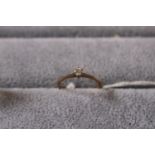 Ladies 9ct Gold Diamond Solitaire ring 1.1g total weight. Size M