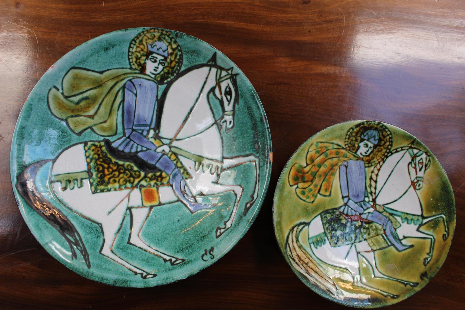 2 Chelsea Pottery Bowls with Horse back rider decoration on green ground glaze