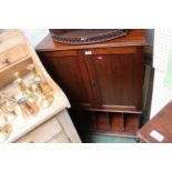 Edwardian Mahogany Cupboard above magazine base on turned bulbous legs