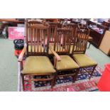 Set of 6 Oak Edwardian dining chairs with curved backs and upholstered drop in seats and tapering