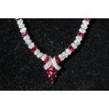 Costume White metal Ladies necklace set with Red an clear stones