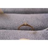 Ladies 9ct Gold Diamond Set single stone ring.1.1g total weight. Size N