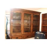 Good quality triple glazed dresser with panelled glass doors over drawer and cupboard base