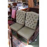 Pair of Chesterfield company button back hall chairs on straight supports