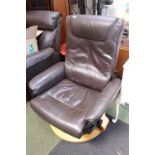 Brown Leather upholstered Elbow chair on Beech Base