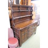 Ercol Dresser with drawer base flanked by Cupboards