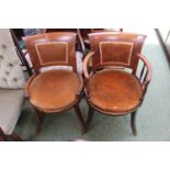 2 Walnut Chairs with circular upholstered seat