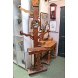 Victorian Mahogany Veneered Hallstand with scroll arms, Circular mirror over glove box and drip tray