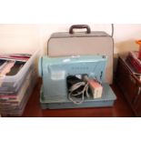 Singer Turquoise coloured Sewing machine