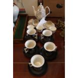 Gilded Bone China Coffee Set and a Portmeirion Magic City set of Coffee cans and Saucers