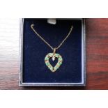 Ladies 9ct Gold Emerald and Diamond Set Heart shaped pendant on chain 2.5g total weight