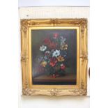 19thC Oil on canvas of floral still life, unsigned. In Gilt Gesso frame with foliate decoration.