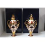 Pair of Royal Crown Derby Tissington Urn shaped vases with lids. 20cm in Height