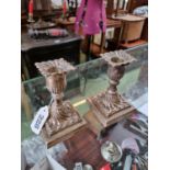 Pair of Silver Candlesticks with embossed decoration London 1897 with weighted bases