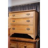 Edwardian Satinwood chest of 3 drawers with bras drop handles on bracket supports