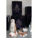 Royal Crown Derby paperweights Beaver and Meerkat with Gold stoppers and boxes