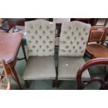 Pair of Chesterfield Company upholstered hall chairs with straight supports