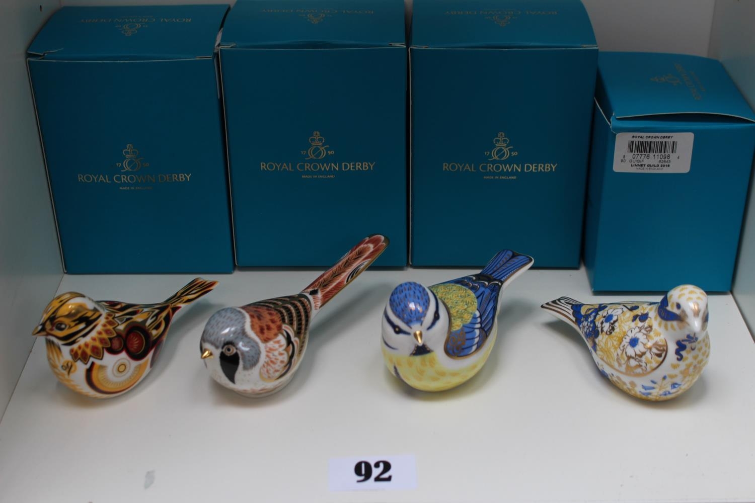 Collection of 4 Royal Crown Derby paperweights to include Bearded Tit, Blue Tit Yellow Hammer Linnet