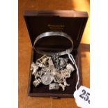 Ladies SIlver charm bracelet and assorted Silver Charms and a Silver engraved Bangle 80g total