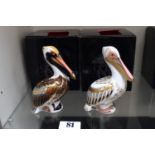 2 Royal Crown Derby paperweights of Pelicans with Gold stoppers and boxes