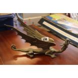 Good Quality Arts & Crafts Brass figure of a Dragon with outstretched wings, forked tail and upright