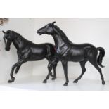 2 Beswick horses in black matt glaze with marks to feet
