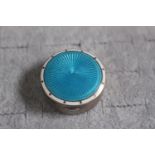 Good quality Circular Silver enamelled hinged pill pot with gilded interior