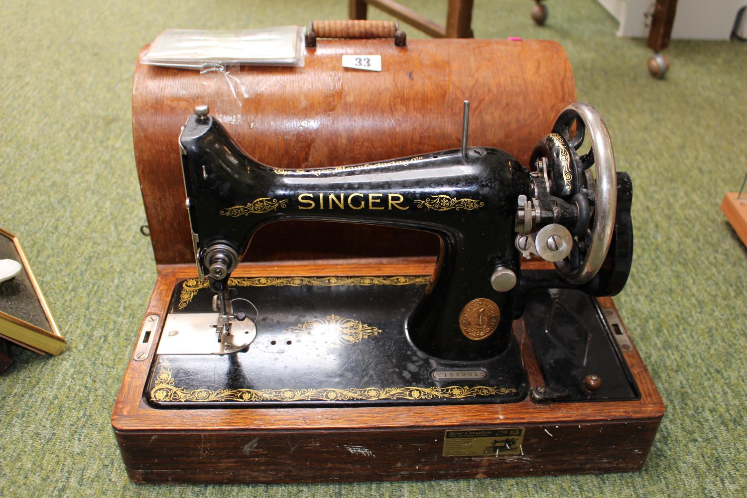 Oak Cased Sewing machine Y1599015 with Instruction Manual