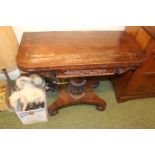 19thC Rosewood fold over card table on trefoil base with Baize to interior