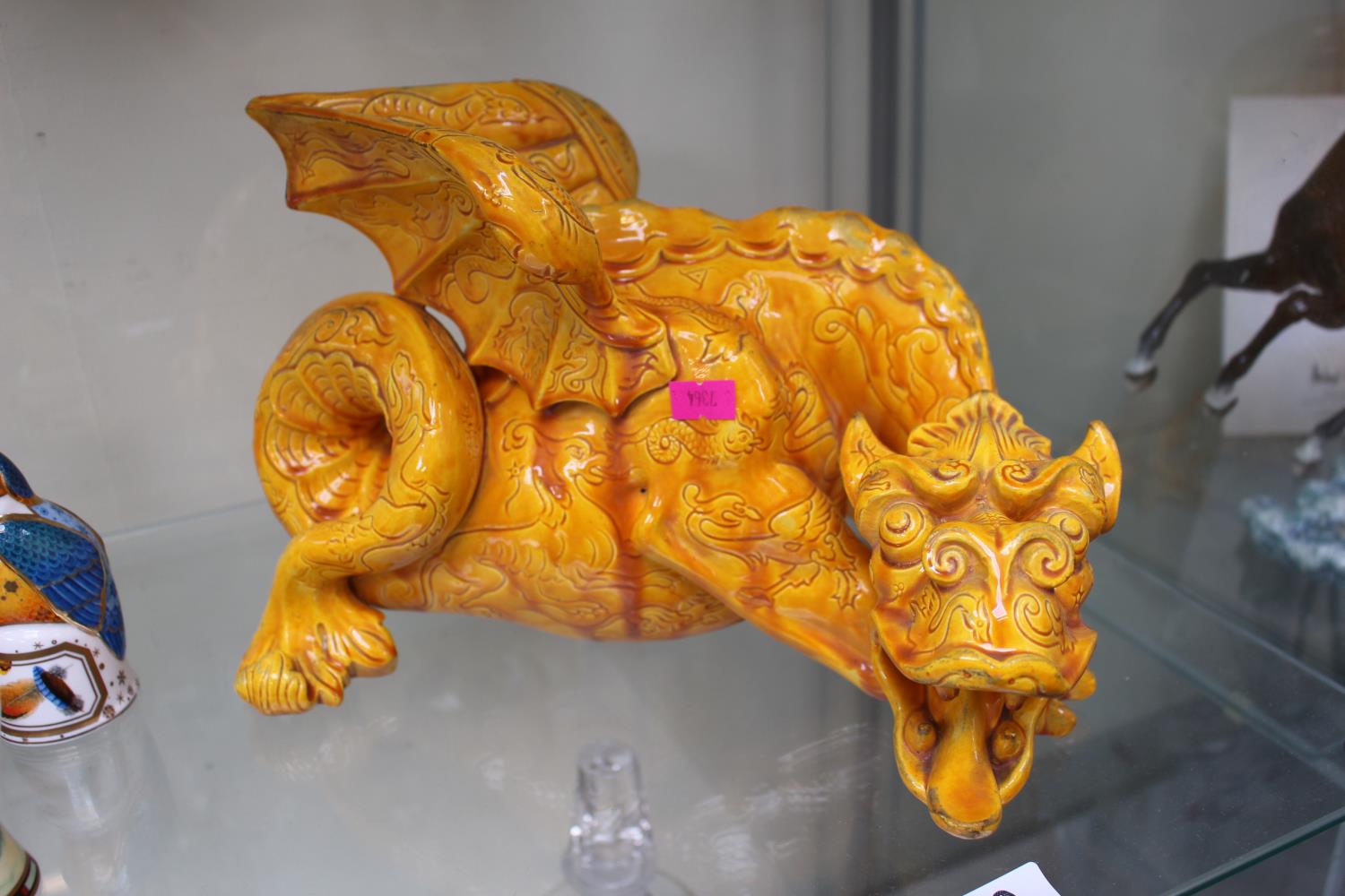 Impressive Grove & Stark Pottery model of a Dragon in Yellow glaze. 30cm in Length