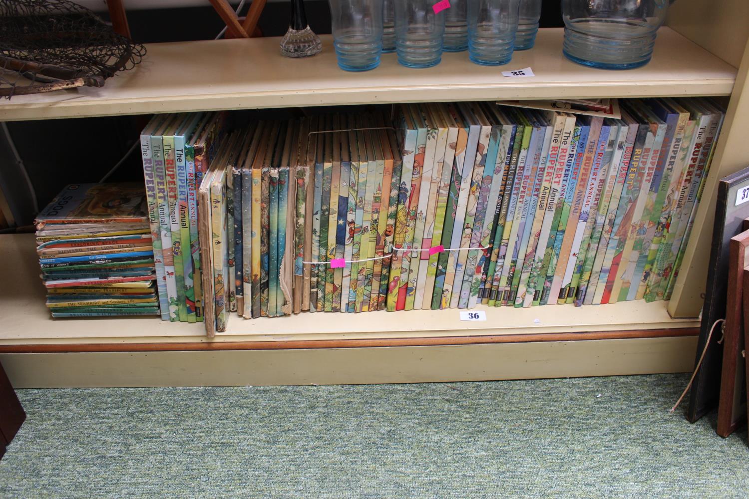 Large collection of Rupert Annuals and a collection of Ladybird books