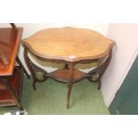 Edwardian Oval shaped top table with pierced supports and shaped under tier. 72cm in Width