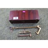 Mahogany brass bound travelling optical instrument and a French brass glass cutter