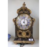 Late 19thC French Boulle mantel clock, The ormolu mounted arched case with all-over brass inlaid