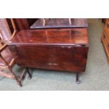 19thC Mahogany drop leaf table on slender legs and pad feet