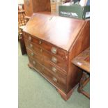 Georgian Mahogany Fall front bureau with fitted interior and brass drop handles and bracket feet