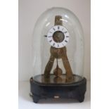 19th Brass skeleton clock with enamelled roman numeral dial under glass dome