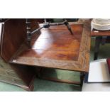 Good quality 19thC Fold out table with leather inset, highly caved detail over carved foliate legs