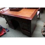 Victorian Mahogany Desk of 9 drawers with turned handles and Leather inset top